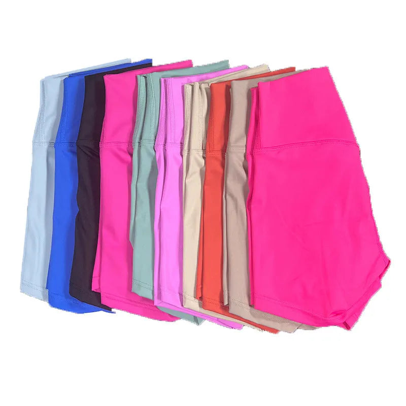 Women's high-waist nylon yoga shorts in pink litchi colour, shown for sports use.