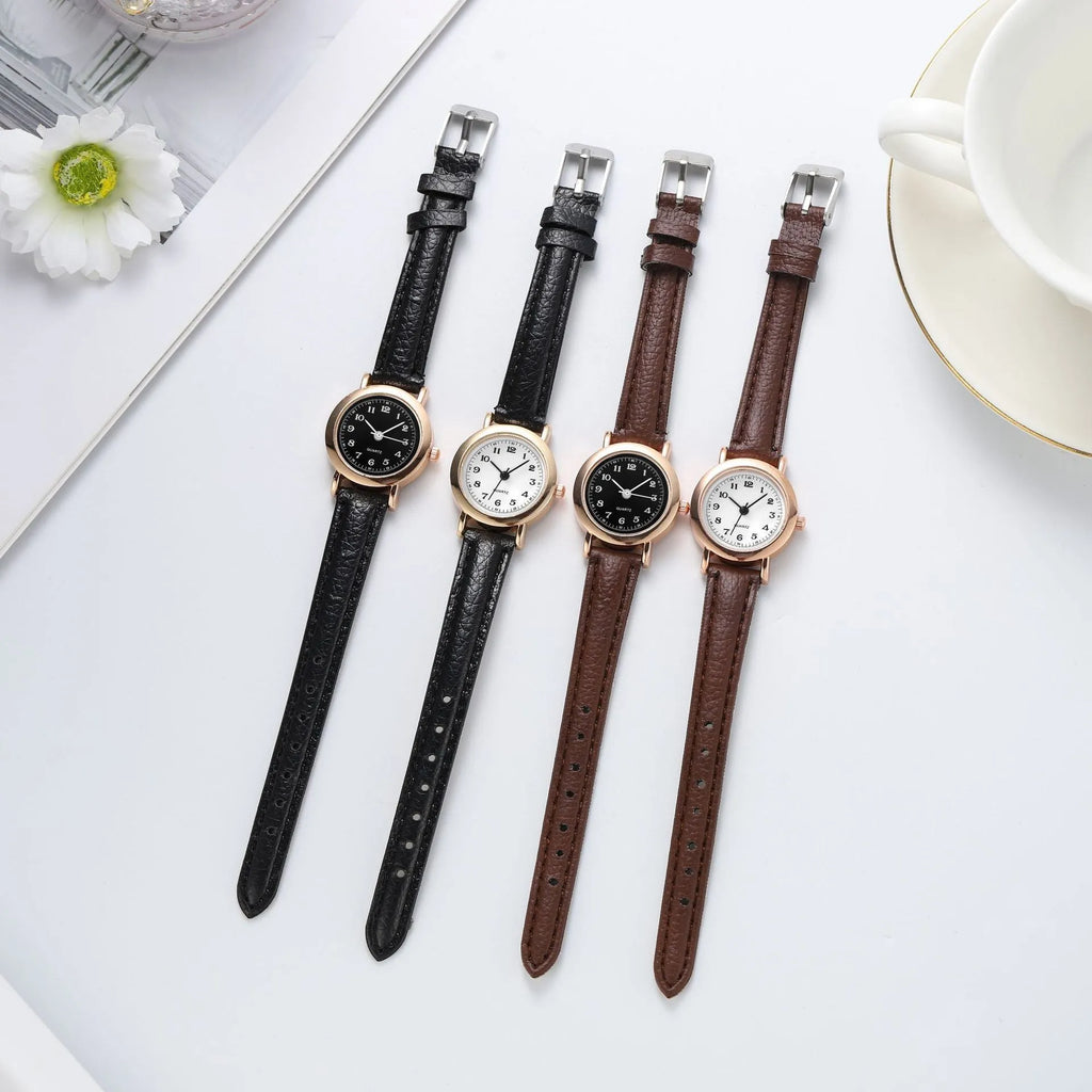 Retro Korean style cute literary couple watch with 26mm round dial, thin imitation leather strap, and spiral crown