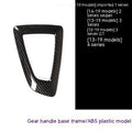 BMW carbon fibre pattern gear base frame panel measuring 13cm by 9cm