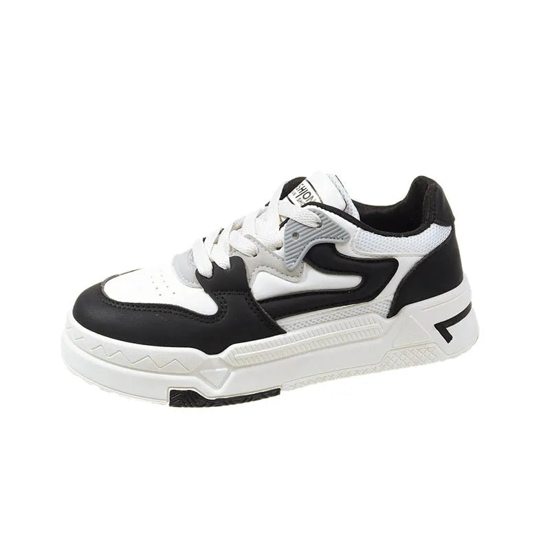 Women's low-top thick bottom casual skate shoes in black with rubber sole and front lace-up closure
