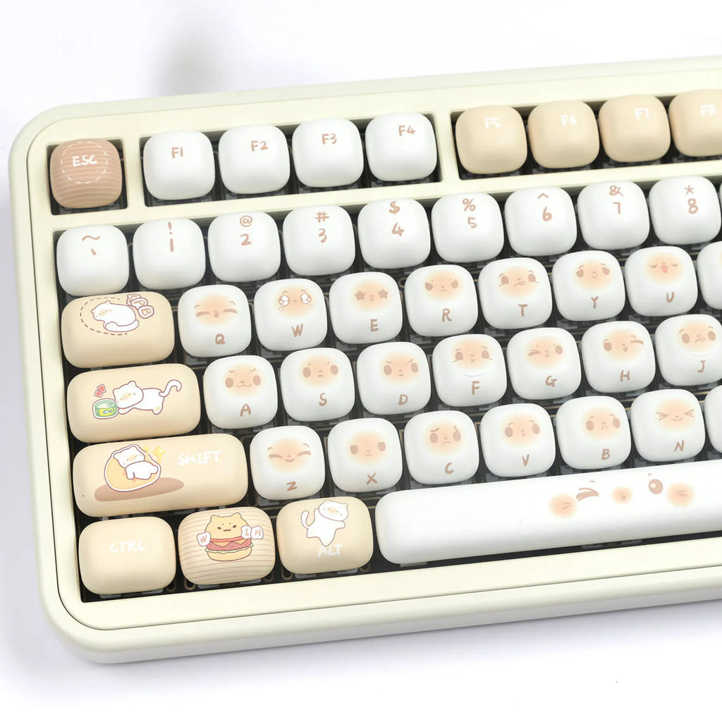 Steamed bread character march past design on a set of white PBT 7u keyboard key caps.
