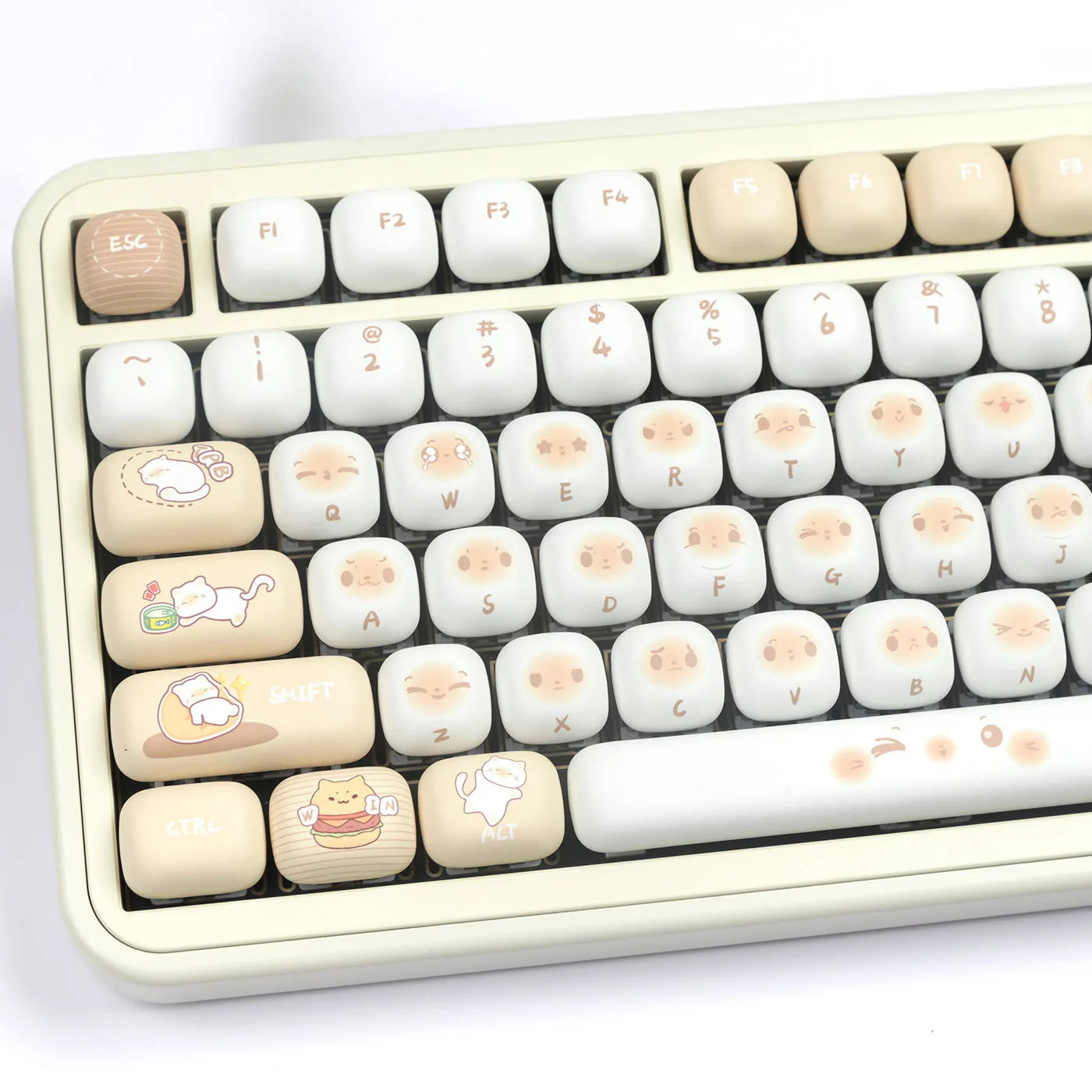 Steamed bread character march past design on a set of white PBT 7u keyboard key caps.