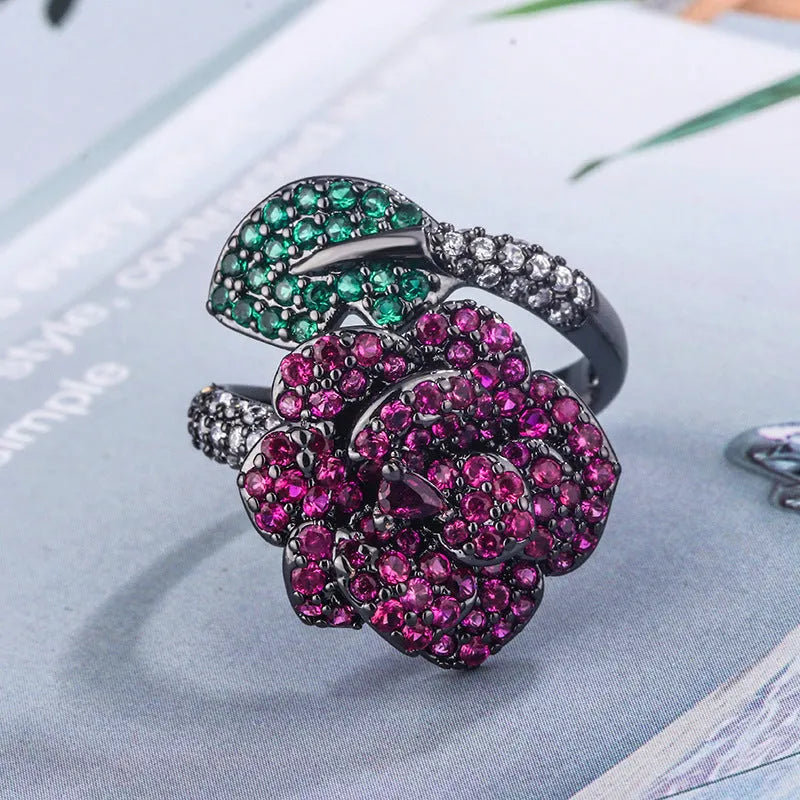 Black gold geometric flower ring with simulated red corundum stones on copper base