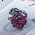 Black gold geometric flower ring with simulated red corundum stones on copper base