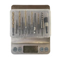 Silver household hexagonal handle screw extractor 12-piece set on a dark surface
