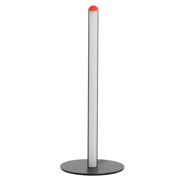 Tall, slim aluminium alloy vertical LED floor lamp standing beside a modern sofa.