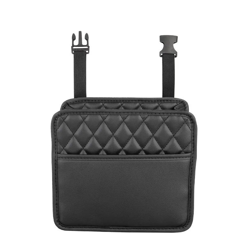 Black leather hanging storage bag attached to a car seat headrest.