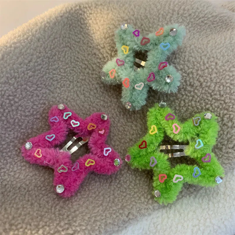 Plush diamond-encrusted five-pointed star hair clip for bangs in multiple colours including green, red, and yellow