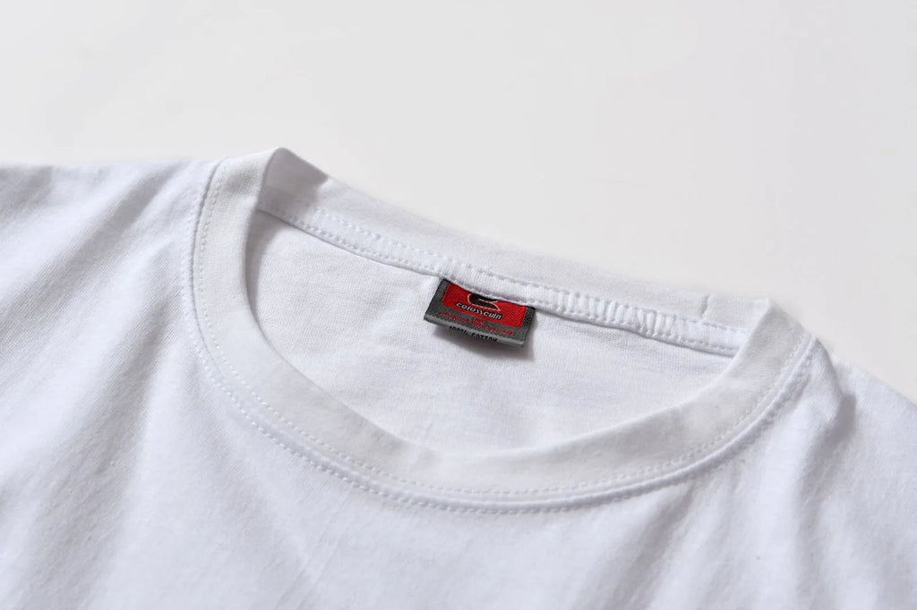 White cotton denim overalls with round neck and short sleeves, loose fit pullover style