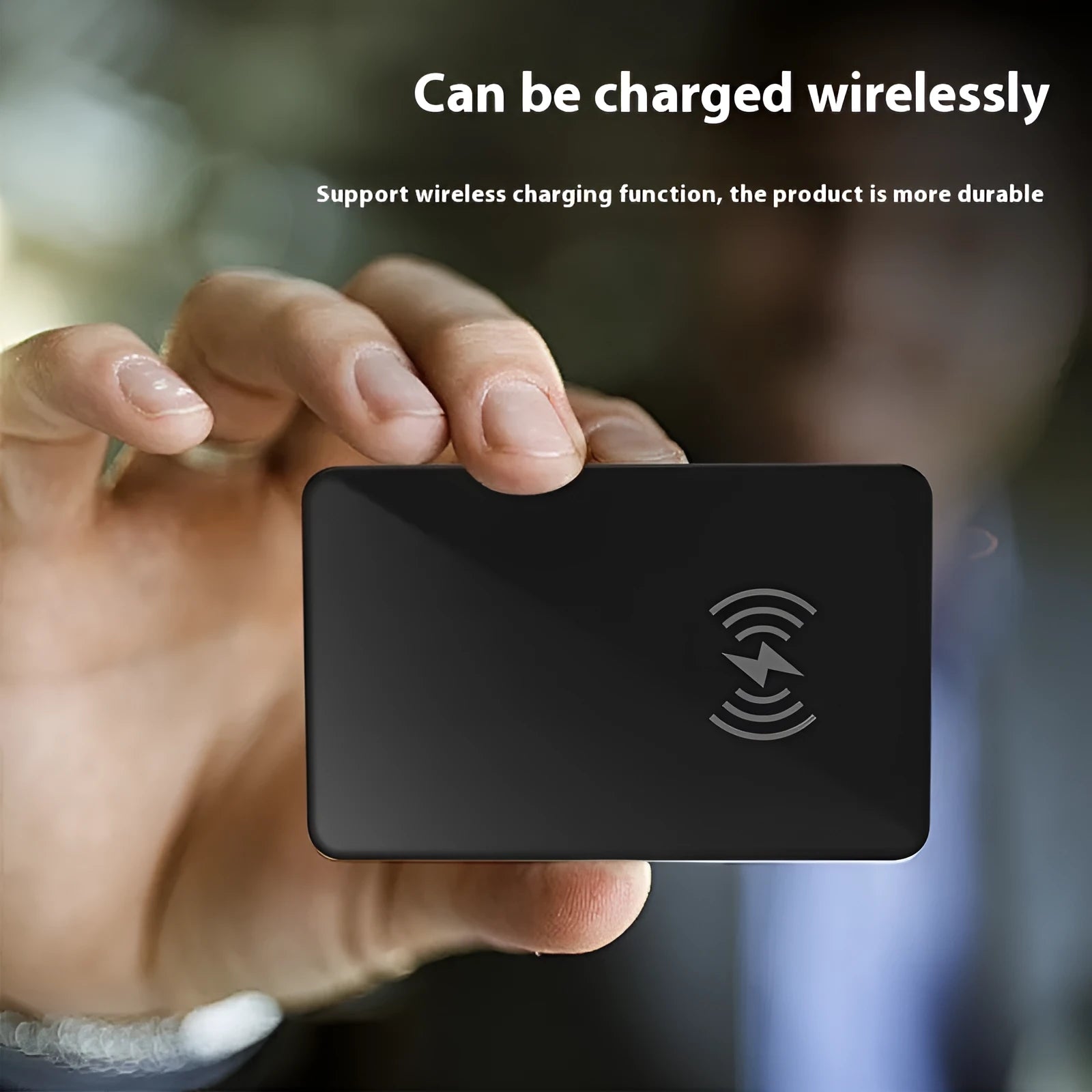 Black card-shaped pet tracking device with wireless charging and NFC capabilities