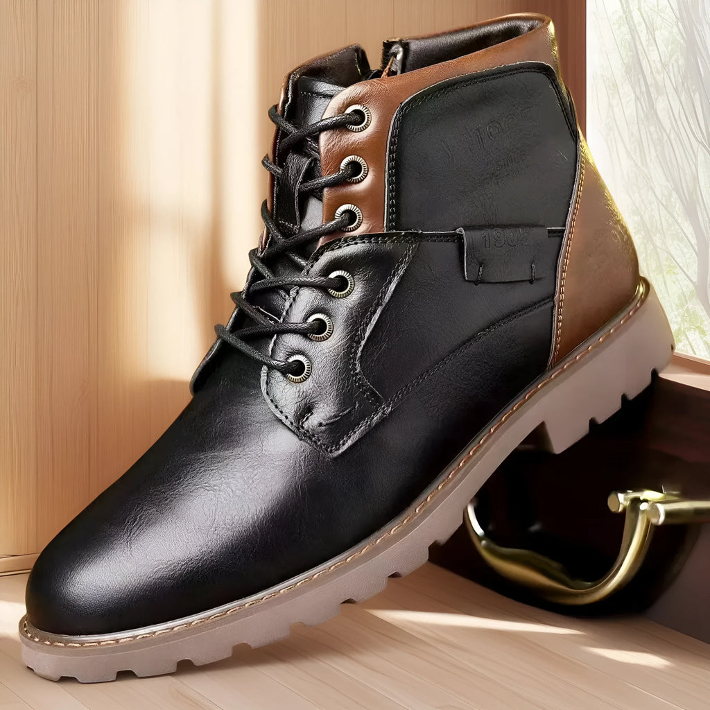 Men's brown leather-style ankle boot with a side zip and round toe on a rubber sole.