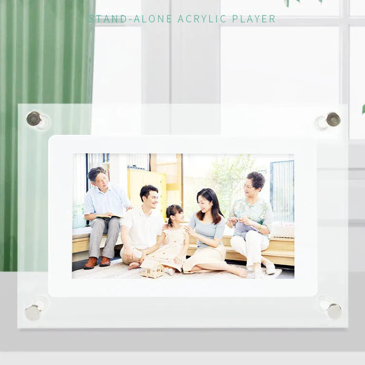 White vertical digital photo frame with 5-inch screen showing family photographs