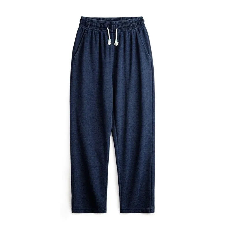 Men's indigo polyester straight fit casual trousers with micro elastic waist, front view