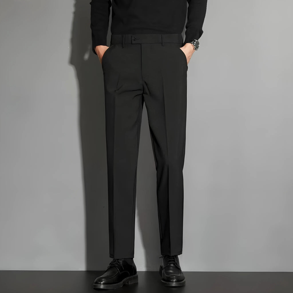 Men's straight-leg ankle-length suit trousers in apricot colour showing business gentleman styling with lightweight draping effect