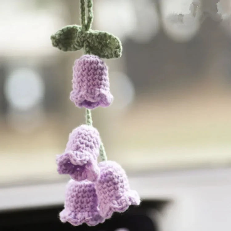 Green and white knitted wool plant ornament for car dashboard with hanging cord
