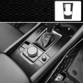 Unksera car interior modification kit with vinyl sticker sheets for dashboard, centre console, and door handles.