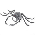 Grey and black spider Halloween costume for a dog on a carpet