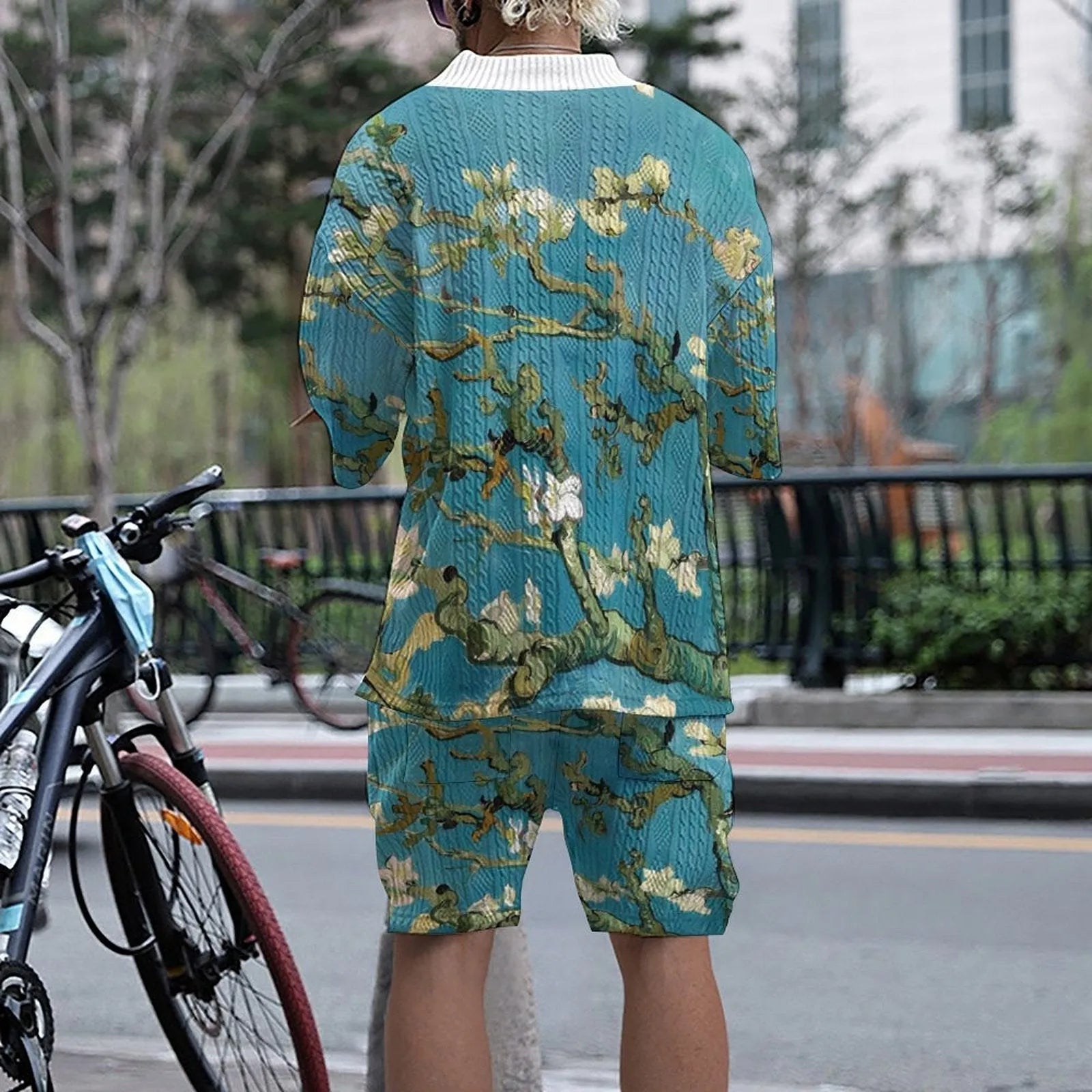 Men's peacock blue 3D printed knitted shorts suit with matching T-shirt jacket.