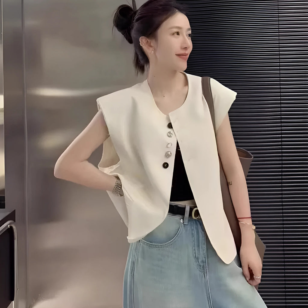 Women's loose fit polyester sleeveless vest in milky white with a visible pocket detail.