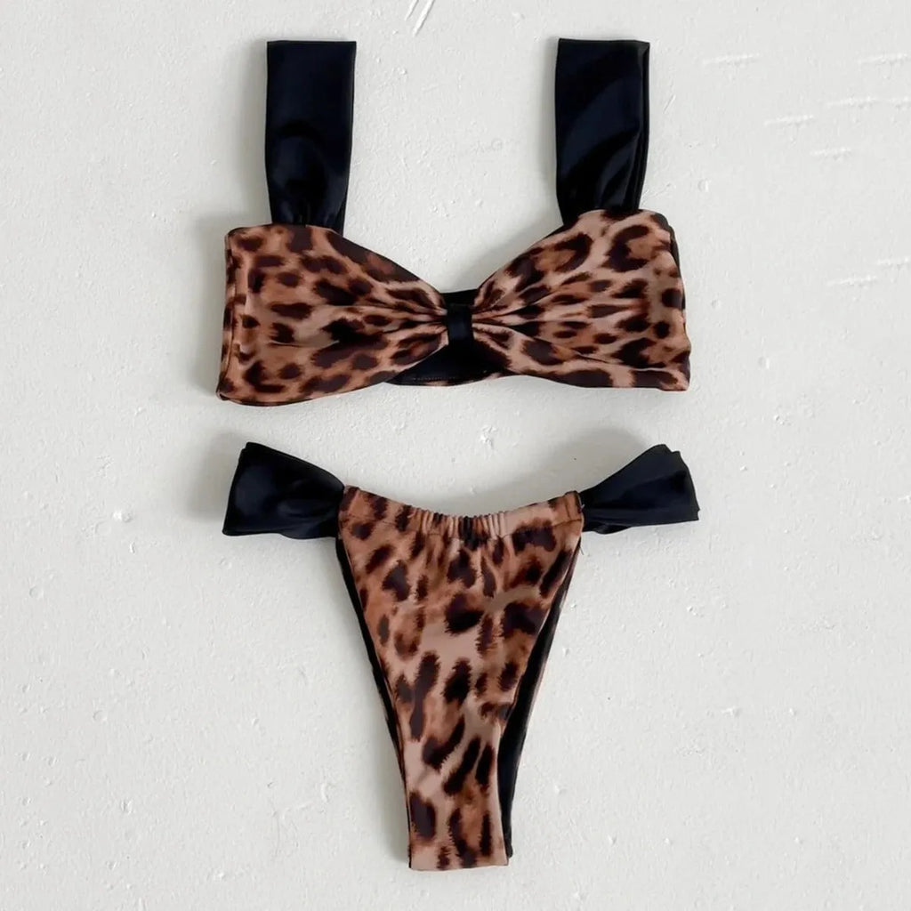 Women's leopard print bikini set with tube top and split bottoms in black and animal print