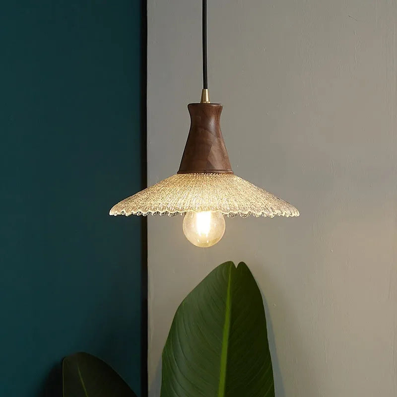 Retro wooden chandelier with glass shade and brass fittings for ceiling lighting.
