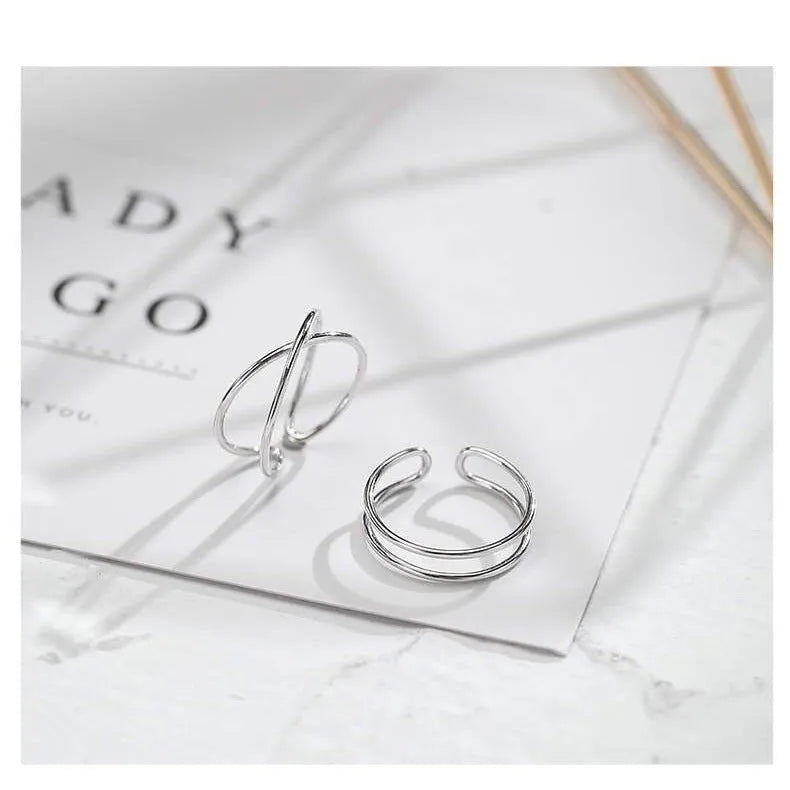 Silver plated geometric cross ring for women with adjustable opening in colour 23 and 24 options