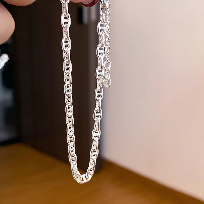 925 sterling silver chain bracelet with pig nose charm, polished silver colour, stackable design