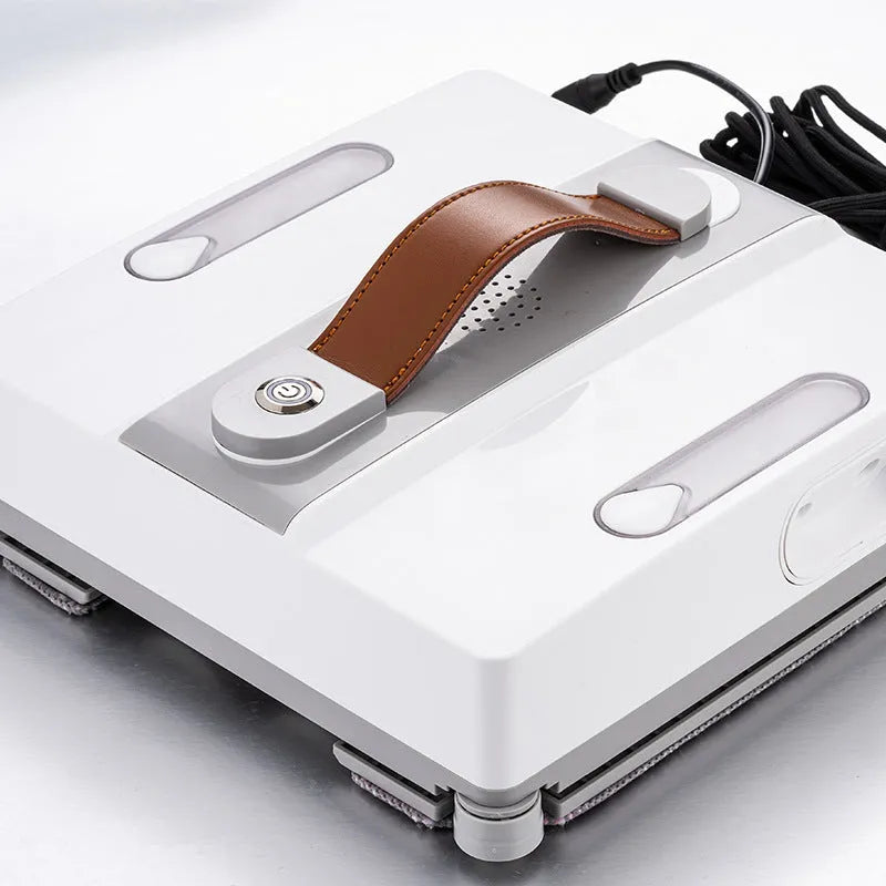 White intelligent window cleaning robot for automated high-rise window washing.