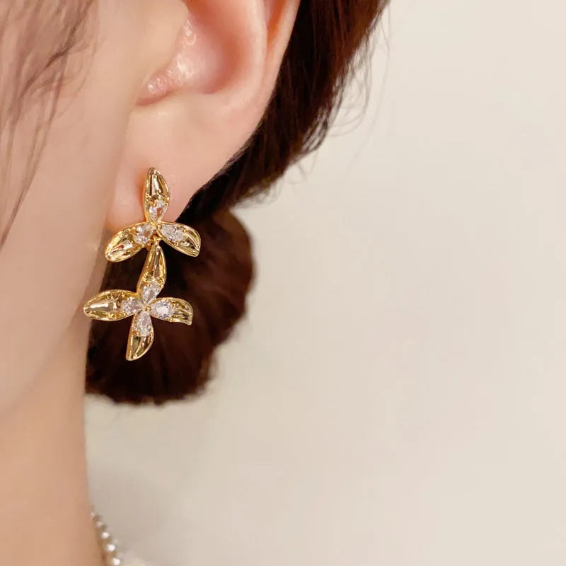 Women's real gold plated copper petal tassel earrings with metal diamond fringe in simple flower shape