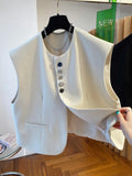 Women's loose-fitting waistcoat dress in polyester with pockets, shown in beige and black colour options