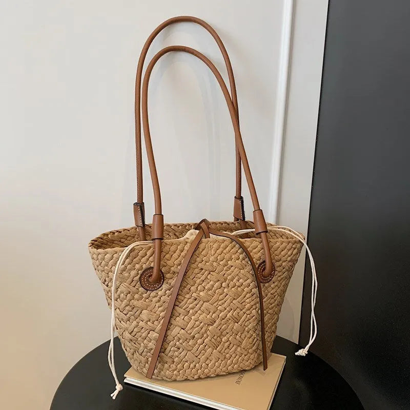 Retro style woven shoulder and hand bag in khaki colour with horizontal square design