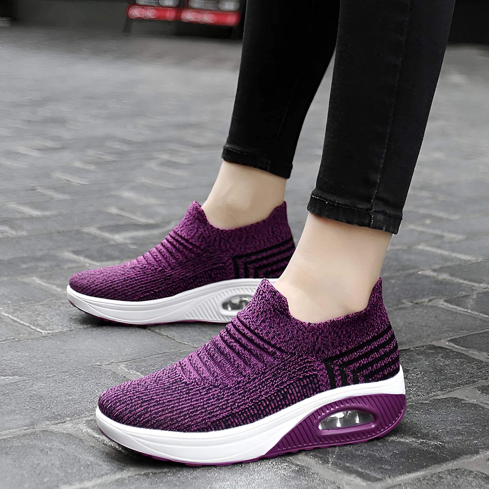 Women's platform slip-on rocking shoes in black, side view, Flyknit upper, round toe