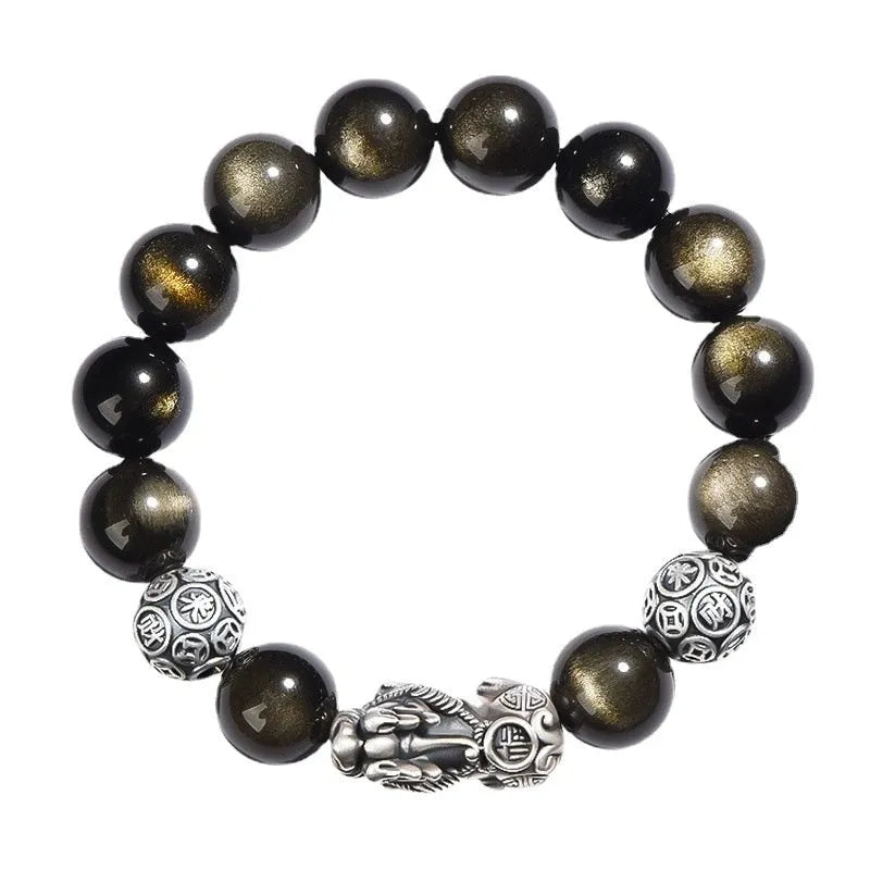Men's sterling silver and obsidian bracelet with geometric design on a brown leather band.