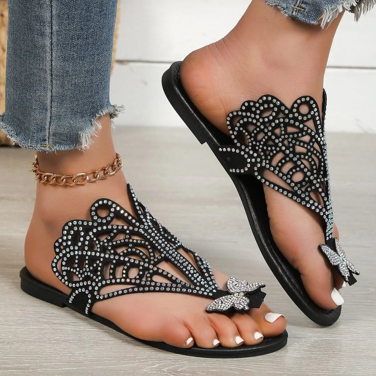 Women's black slip-on flip-toe sandals with rhinestone decoration on hollow PU upper