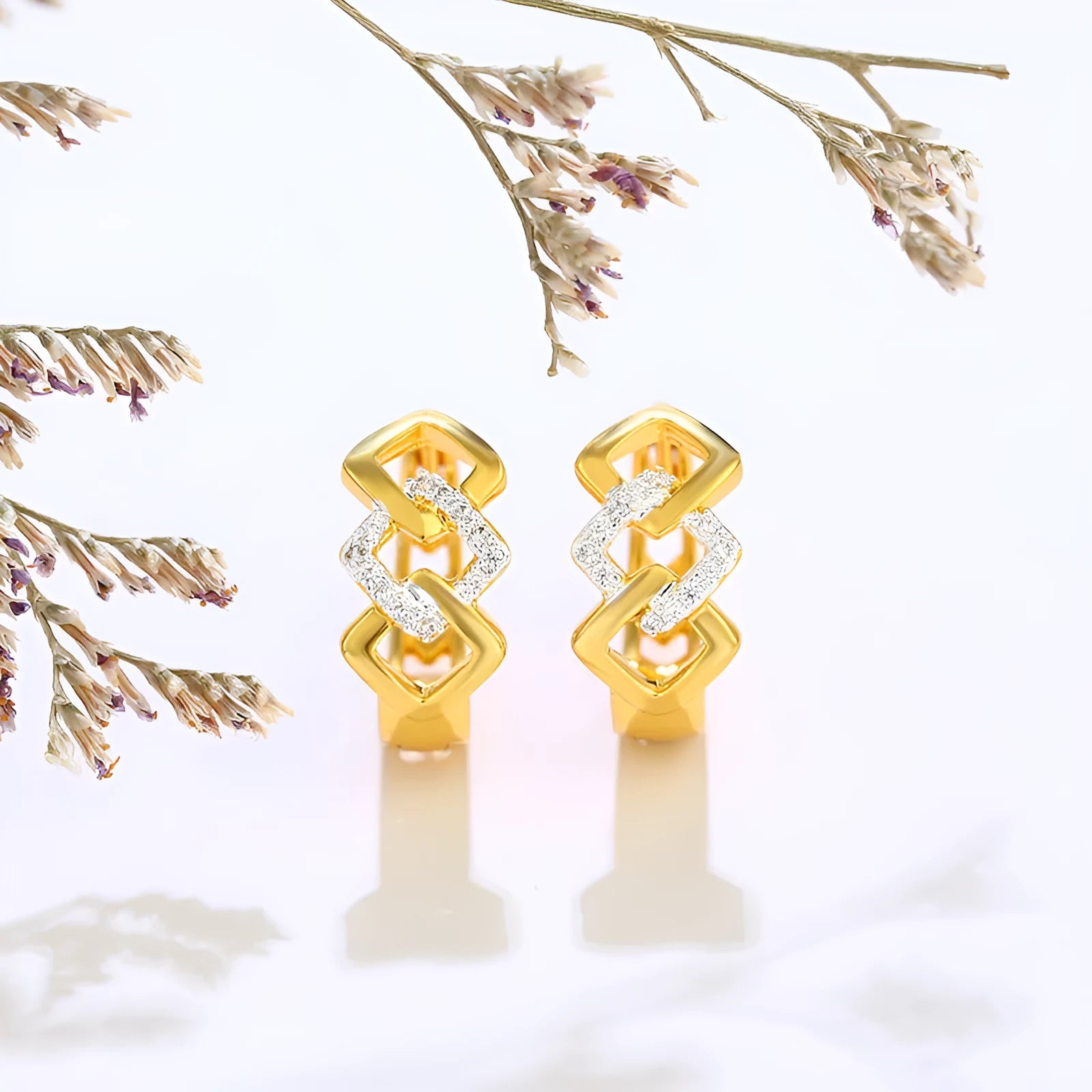 Gold geometric hollow-out clip-on earrings with electroplated alloy construction