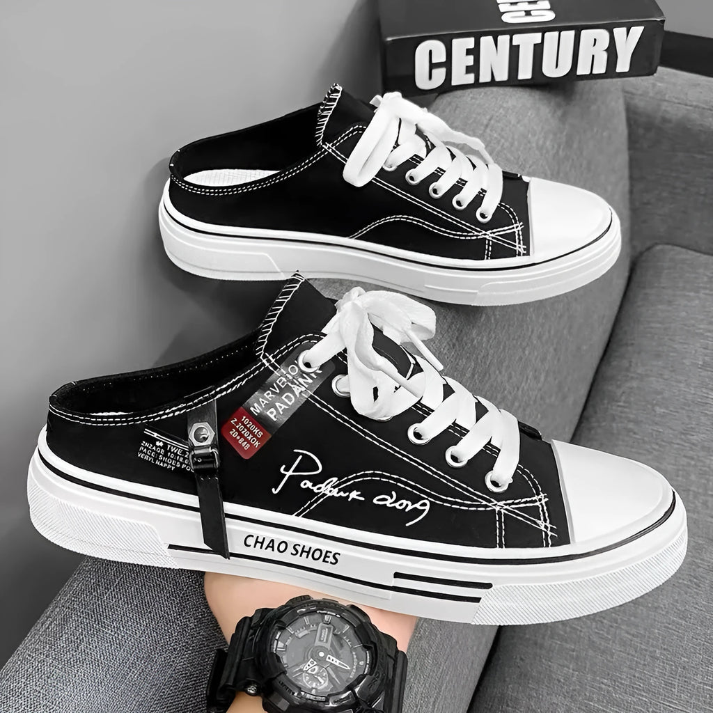 Men's canvas slip-on shoes in black with round toe and PVC sole