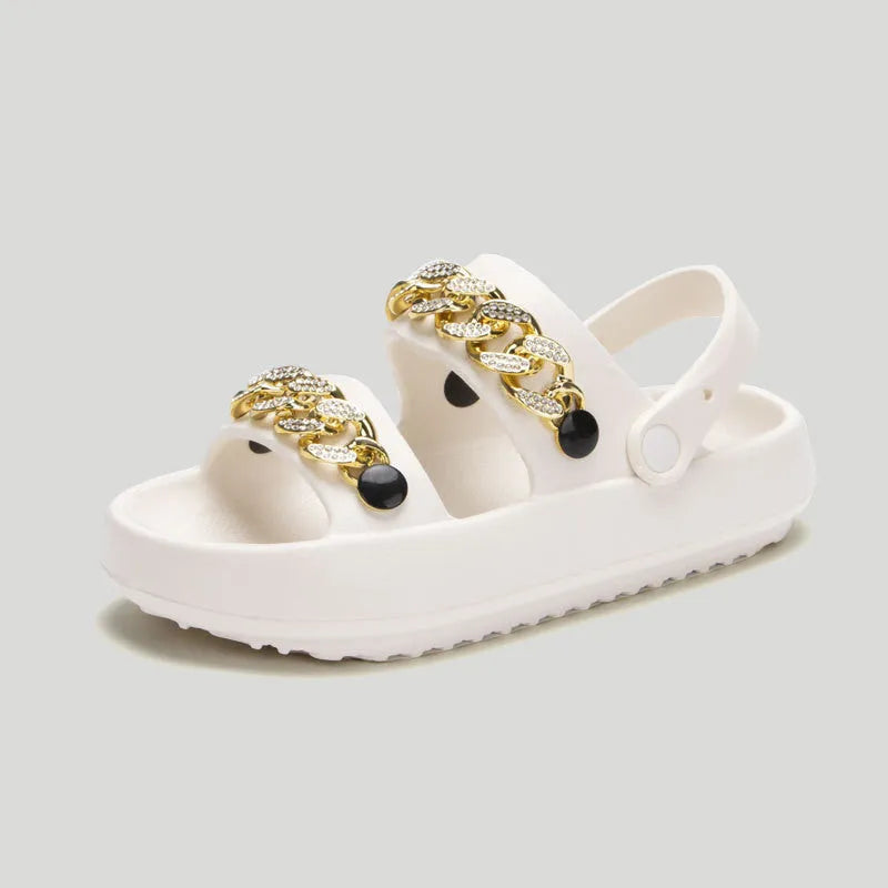 Women's thick-soled EVA slippers with buckle fastening and round toe, in black or beige, for indoor and outdoor wear.