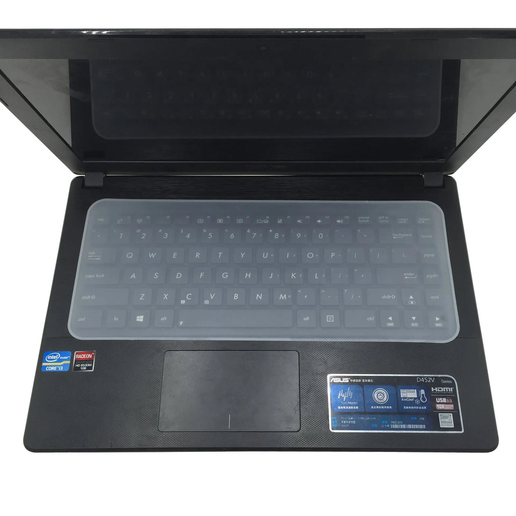 Transparent silicone keyboard dust film for laptop, showing close fit over keys