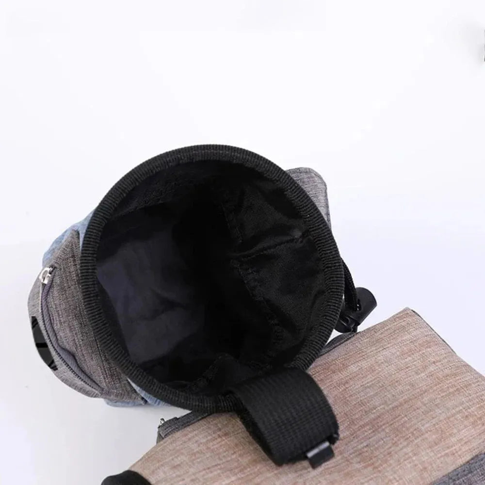 Portable pet outdoor training waist bag in blue, showing clip and elastic opening.