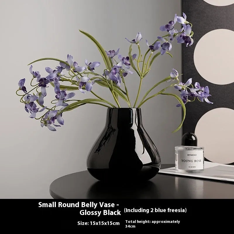 Round belly ceramic vase in black or white with optional artificial flowers arrangement