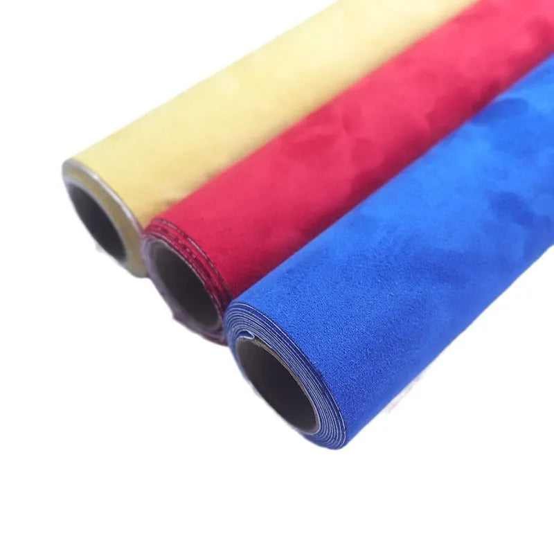 Self-adhesive leather suede sheet in beige colour showing texture and adhesive backing.