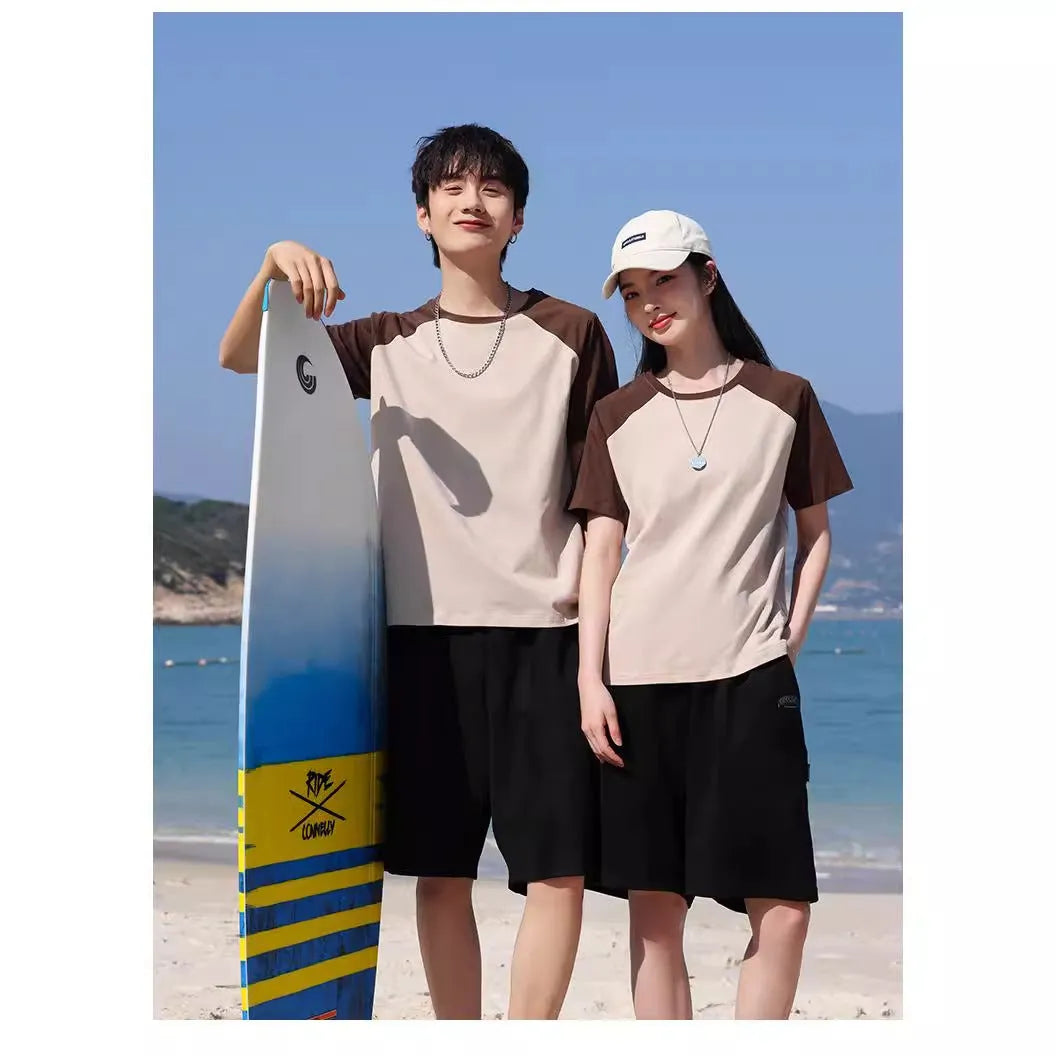 Round neck loose fit cotton blend t-shirt in army green colour on a hanger.