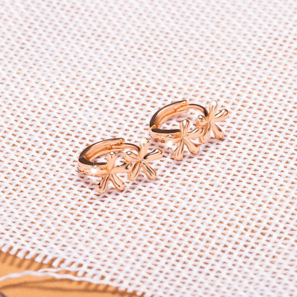 A pair of circular rose gold waterdrop flower earrings for women with a fresh, sweet style.