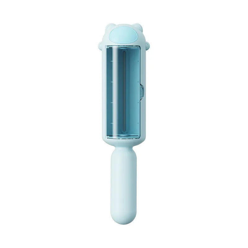 Blue reusable pet hair remover with self-cleaning base on a carpet.