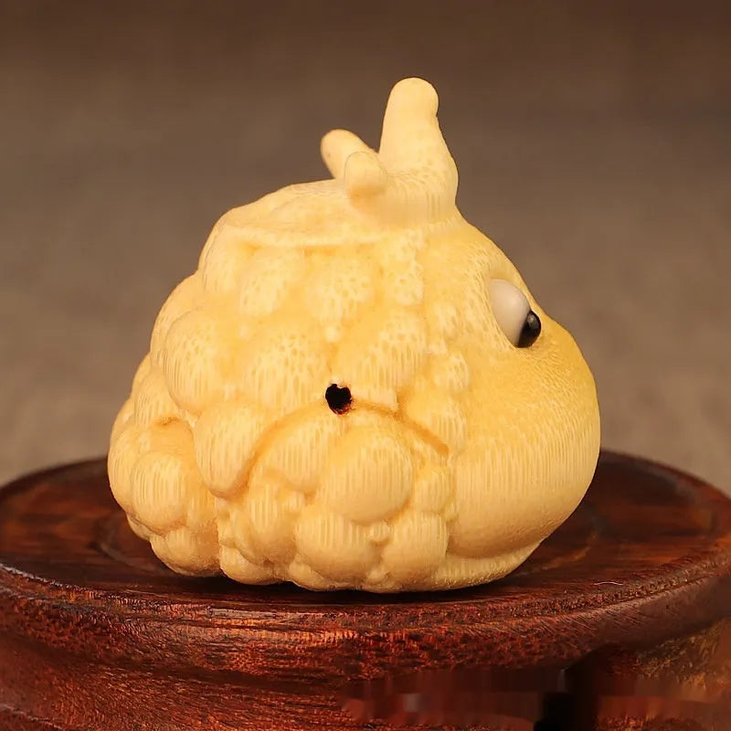 Solid bamboo carving of a cute Crown Princess Toad figurine, 5 cm in size.