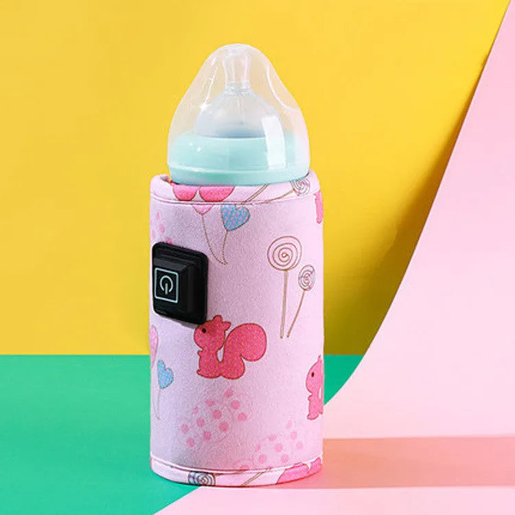 USB baby bottle warmer insulation cover in blue dinosaur cartoon print, showing portable cooler bag design.