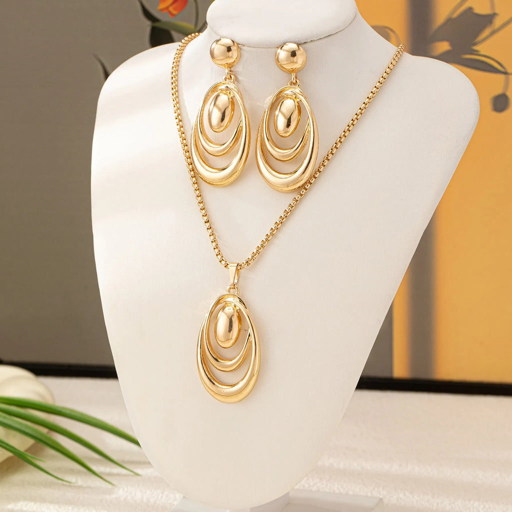 Fashion creative multi-ring drop shape earrings necklace three-piece set in golden alloy for women