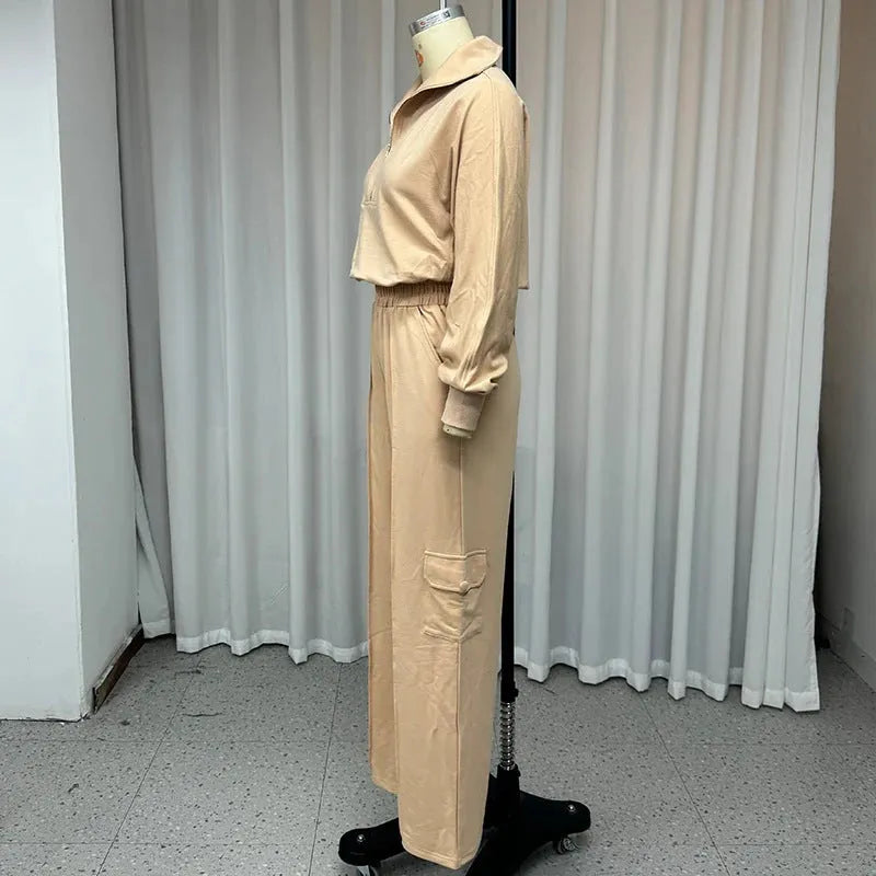 Light camel women's lapel top and wide-leg trousers two-piece workwear set on a hanger.