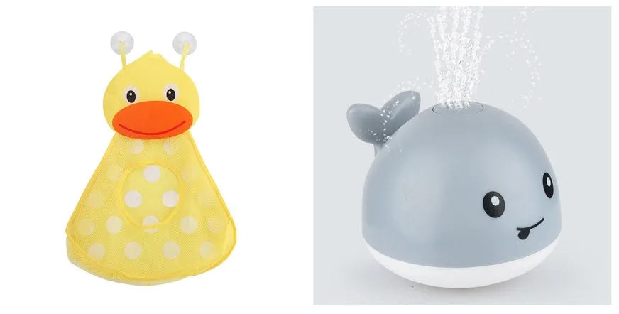 Whale-shaped electric bath toy spraying water with flashing lights, floating in baby bathtub