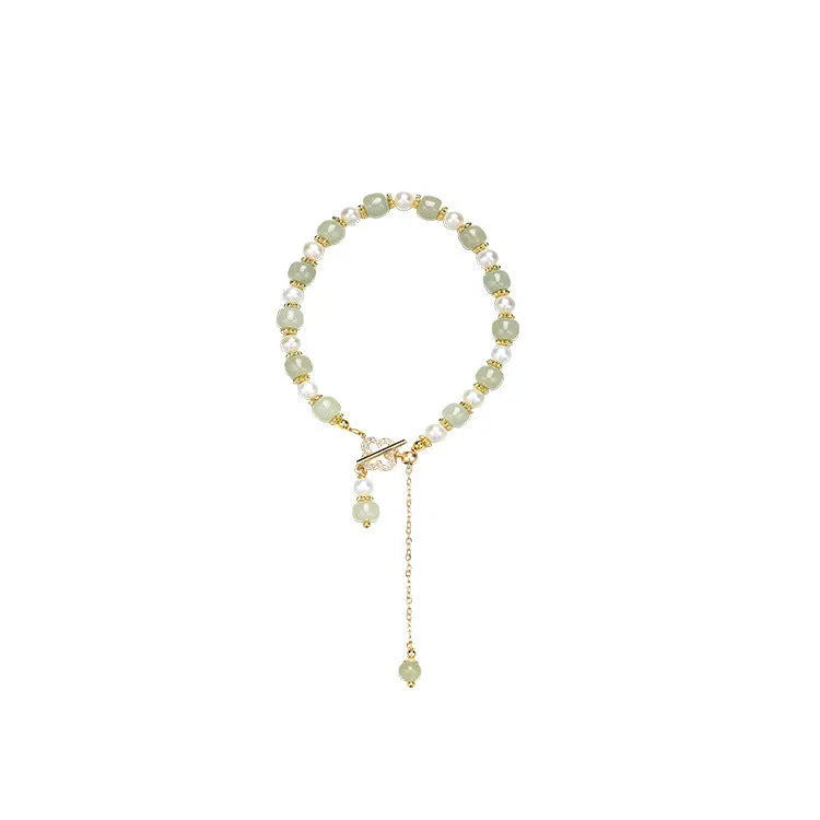 Women's Hetian jade bracelet with pearl pendant and electroplated gold alloy metal in Chinese style